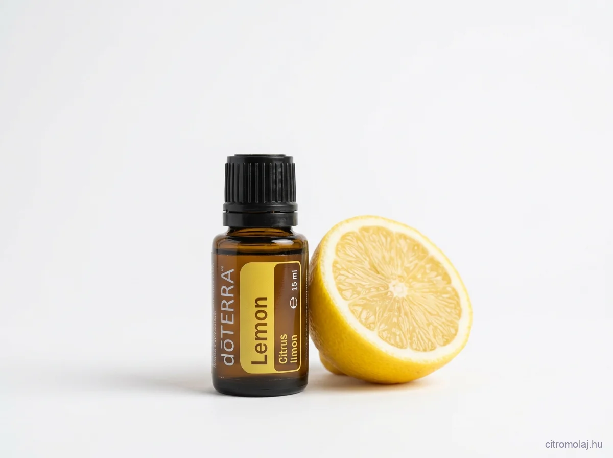 doTERRA Lemon (Citrus limon) feliratú, 15 ml-es barna üveg fehér háttéren, mellette félbevágott citrom